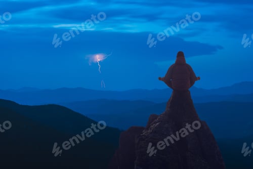 Preview: Silhouette Of Human Meditating In Sitting Yoga Position On The Top Above The Mountain Valley. Zen