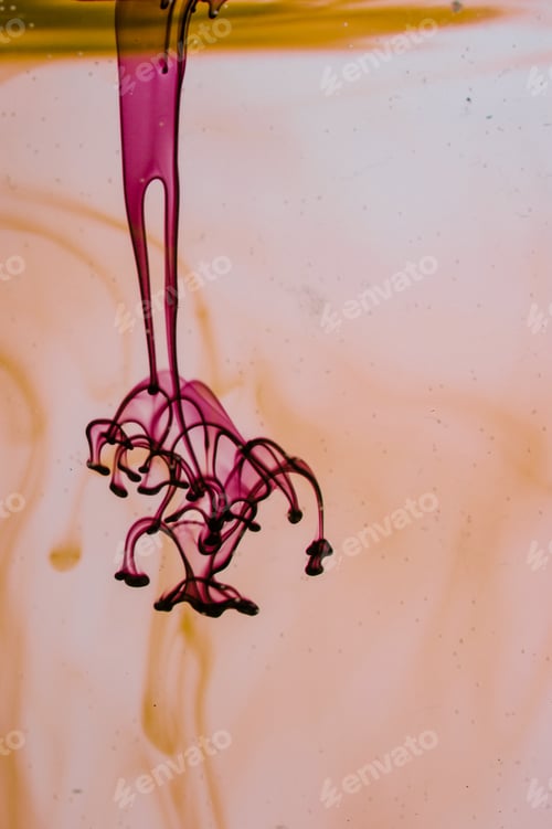 Preview: Yellow And Violet Liquid In Water Making Abstract Forms