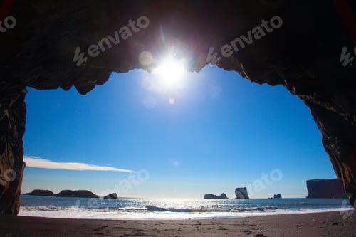 Preview: Black Sand Reynisfjara Beach In Iceland. Rocks And Cliffs At Ocean Beach. A Popular Tourist Spot On