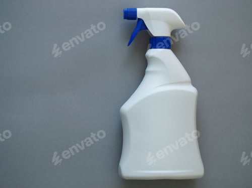 Preview: White Spray Bottle On A Gray Background With Place For Text.