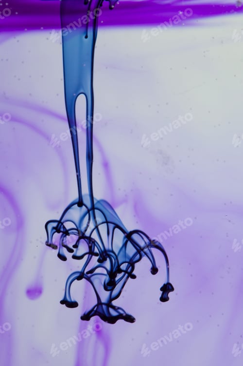Preview: Blue And Violet Liquid In Water Making Abstract Forms