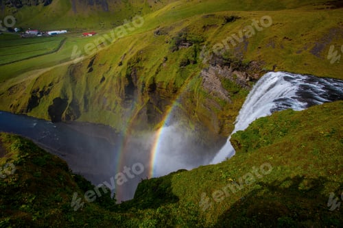 Preview: Skogafoss Waterfall And Raibow In Sunny Day In Iceland