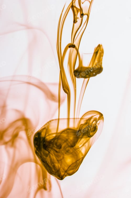 Preview: Yellow Liquid In Water Making Abstract Forms