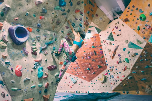 Preview: Strength And Endurance Training. The Climber Trains On The Climbing Wall. A Woman Trains To Climb