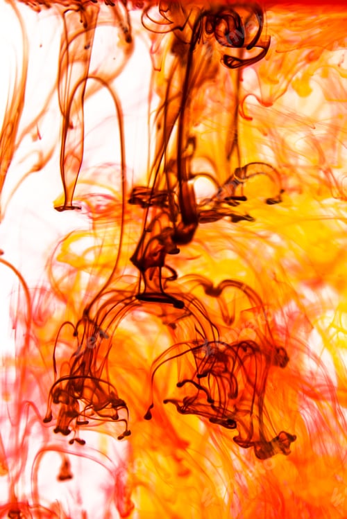 Preview: Red And Yellow Liquid In Water Making Abstract Forms