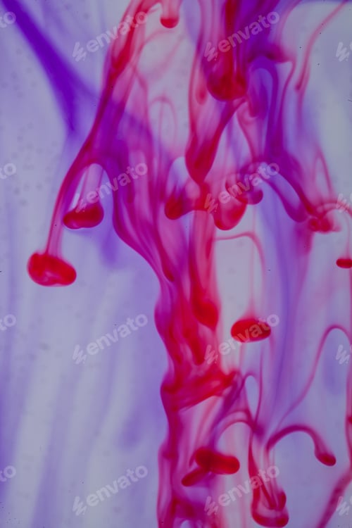 Preview: Red And Violet Liquid In Water Making Abstract Form