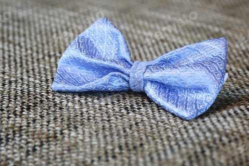 Preview: Elegant Light Blue Bow Tie on Woven Fabric