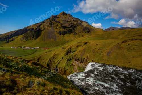 Preview: Skogafoss Waterfall And Raibow In Sunny Day In Iceland