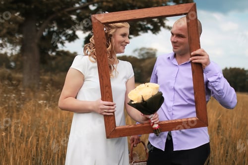 Preview: Just Married Lovers Walking In Field In Autumn Day
