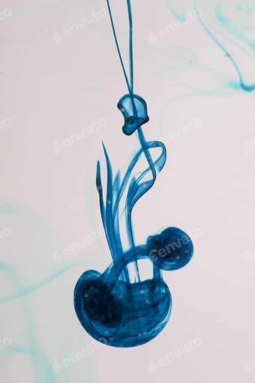 Preview: Blue Ink Liquid In Water Making Abstract Forms
