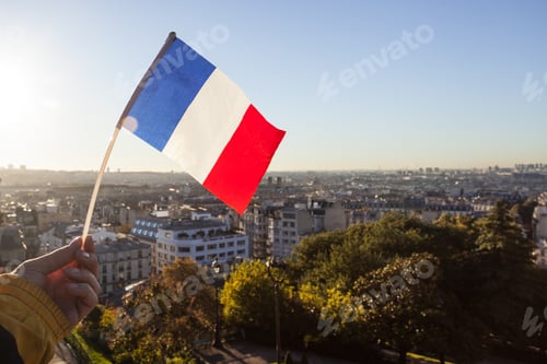 Preview: The Flag Of France On Background Of The View Of Paris From Sacre Coeur Basilica In France In Sunset