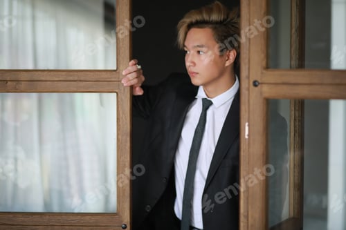 Preview: Young Asian Businessman In White Shirt And Tie