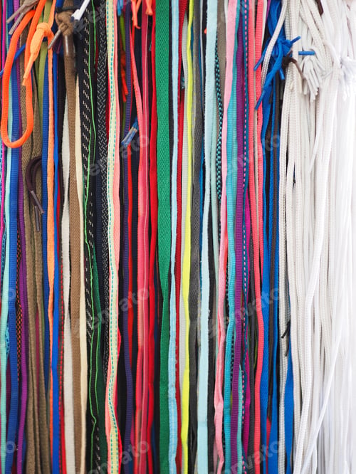 Preview: Lots Of Multi-Colored Shoelaces As Background Blue Orange, Red, Green,White, Brown, Blue.