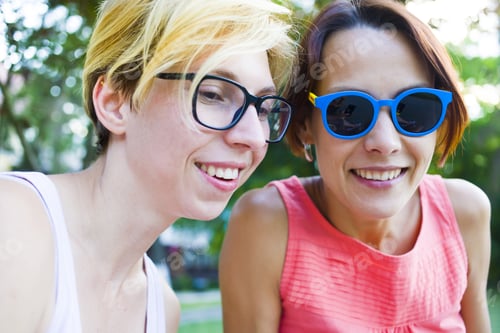 Preview: Two Girls Having Fun In Park During Holiday.