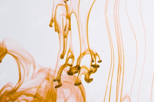 Preview: Yellow Liquid In Water Making Abstract Forms