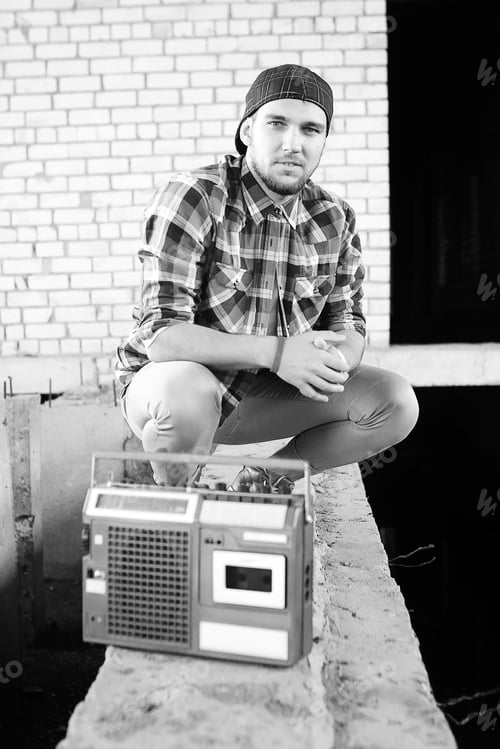 Preview: A Man Dressed In Hip Hop Style Poses On Camera