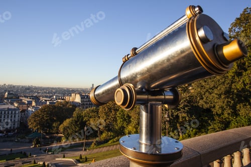 Preview: A Telescope Viewer Overlooks View Paris Skyline From The Montmartre, France
