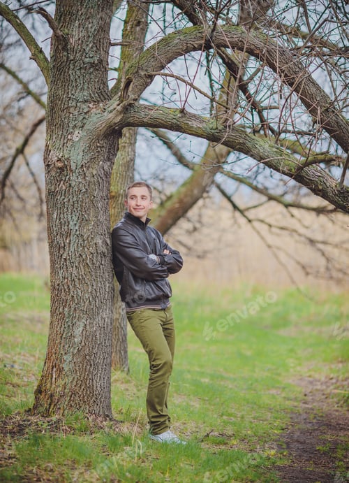 Preview: Portrait Of Young Attractive Man In Nature