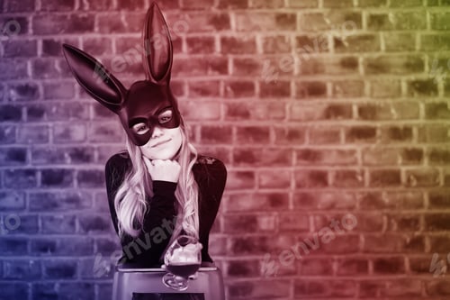 Preview: A Girl In A Black Mask With Long Ears In The Studio