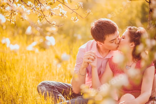 Preview: Portrait Of Young Couple In Flowering Park