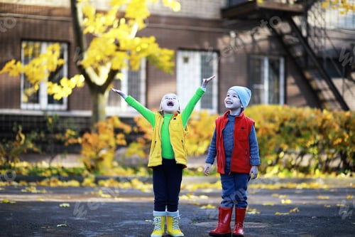 Preview: Children Walk In The Autumn Park In The Fall