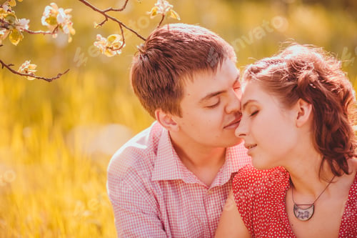 Preview: Portrait Of Young Couple In Flowering Park