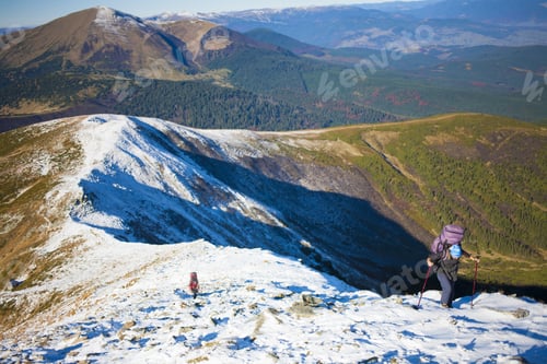 Preview: The Girl Is Engaged In Hiking High In The Mountains.
