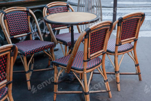 Preview: Empty Tables In Between Dining Hours Along A Paris Cobblestone Alley