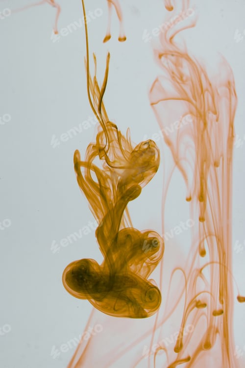 Preview: Yellow Liquid In Water Making Abstract Forms