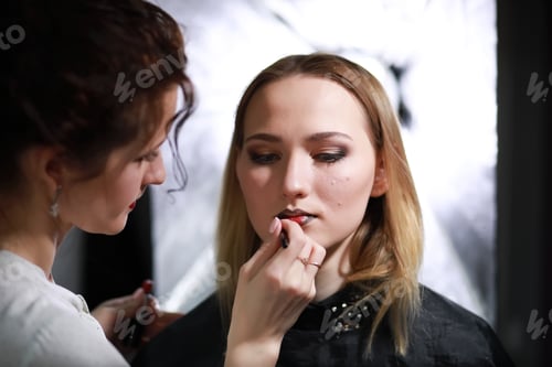 Preview: Young Girl With A Make-Up Artist In The Studio In Front Of A Mirror