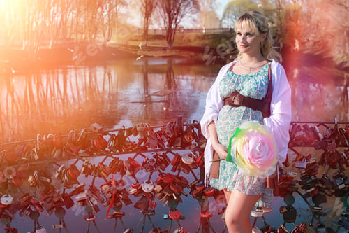 Preview: Pregnant Girl On A Walk In The Park. Girl With A Belly In The City Park. Future Mom Is Walking In