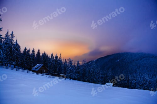 Preview: Wooden House In Winter Forest In Crrpathian Mountains , At Night