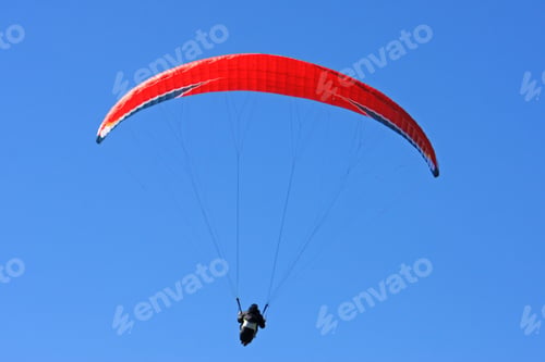Preview: Paraglider In A Blue Sky