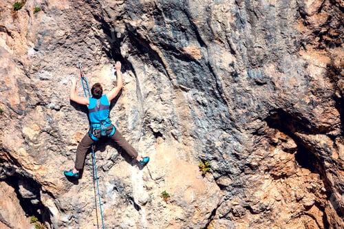 Preview: A Man Climbs The Rock. Climbing In Nature. Fitness Outdoors. Active Lifestyle. Extreme Sports. The