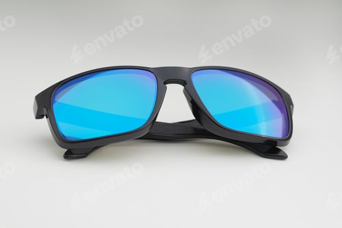 Preview: Close-Up Of Sunglasses With Blue Lenses.