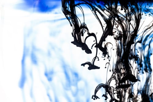 Preview: Blue And Black Liquid In Water Making Abstract Forms