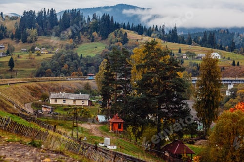 Preview: Vorokhta Village On A Mountain Hill In A Light Of Sunrise. Carpathian Landscape. Autumn Time