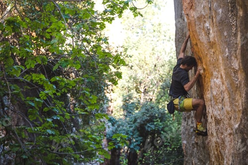 Preview: A Strong Man Overcomes A Difficult Climbing Route On A Natural Terrain. Rock Climber Trains On The
