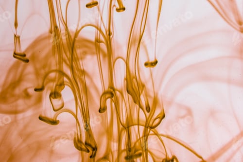 Preview: Yellow Liquid In Water Making Abstract Forms
