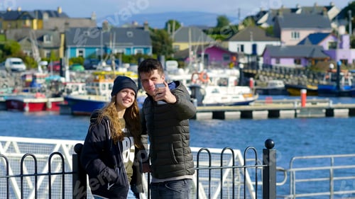 Preview: Young Couple Takes A Selfie At The Harbor Of Dingle