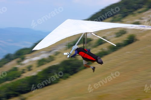 Preview: Hang Glider Pilot In Italian Mountains