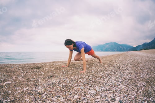 Preview: Woman Doing Sports On The Beach. Push Up. The Girl Does Sports Exercises On The Background Of The