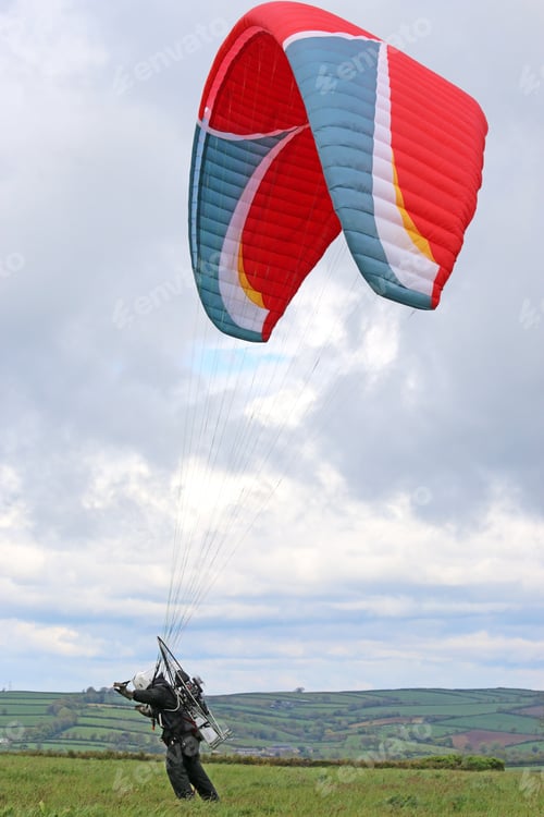 Preview: Paramotor Pilot Launching In A Field