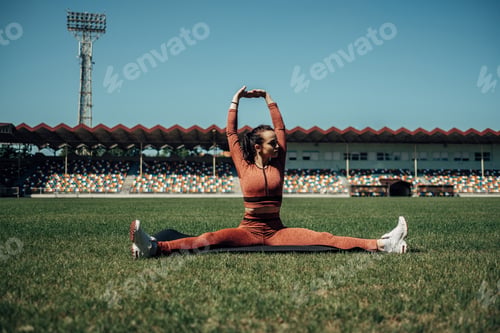 Preview: Portrait Of One Sports Fitness Girl Dressed Fashion Sportswear Outfit Doing Stretches Exercise And