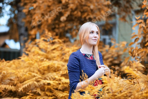 Preview: Girl In The Street With An Umbrella For A Walk On An Autumn Day