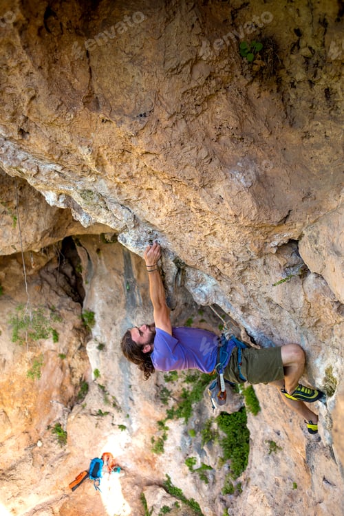 Preview: A Strong Man Climbs A Cliff, Climber Overcomes A Difficult Climbing Route On A Natural Terrain
