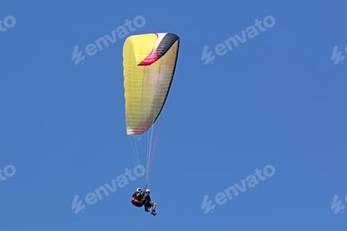 Preview: Tandem Paraglider Flying Wing In A Blue Sky