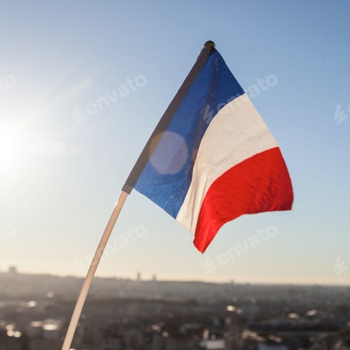 Preview: The Flag Of France On Background Of The View Of Paris From Sacre Coeur Basilica In France In Sunset