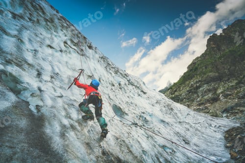 Aperçu: Climber With Axe In His Hand Climbs On A Glacier To The Top Of The Mountain. Caucasus, Georgia