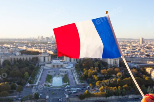 Preview: The Flag Of France Over The Paris City Top View From Eiffel Tower At Sunset Time